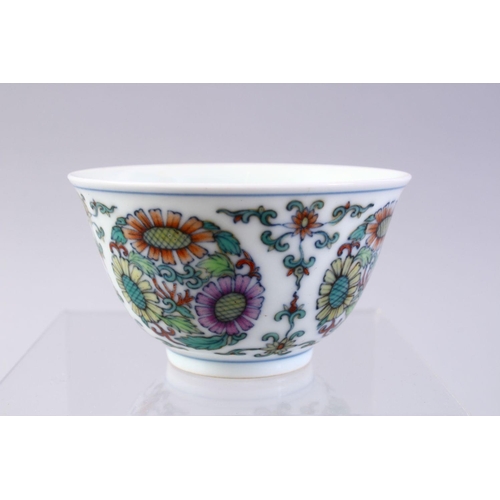 412 - A CHINESE DOUCAI DECORATED CHRYSANTHEMUM PORCELAIN CUP, decorated with roundels of floral displays, ... 