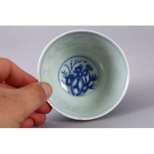 424 - A GOOD CHINIESE BLUE & WHITE MING STYLE PORCELAIN BOWL, decorated with pine trees and bamboo, the ba... 