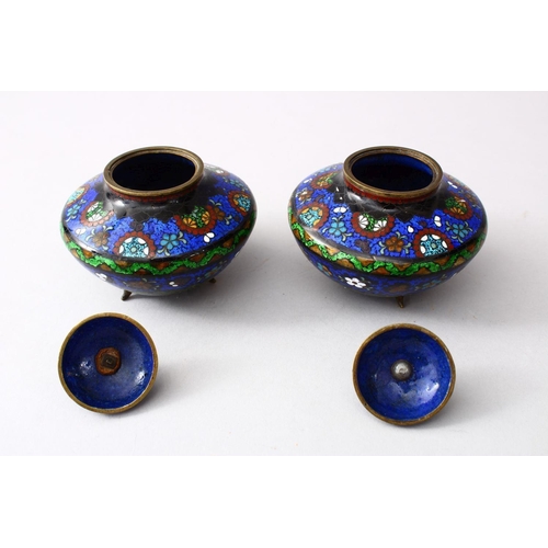 43 - A PAIR OF 19TH / 20TH CENTURY CHINESE CLOISONNE LIDDED KORO, the body of the koro's decorated with a... 