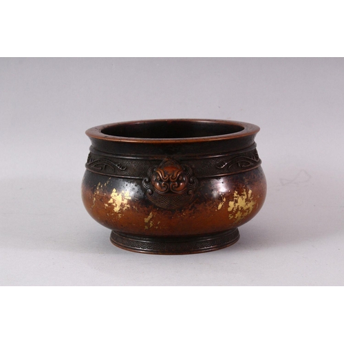 434 - A XUANDE STYLE GOLD SPLASH BRONZE INCENSE BURNER, with kylin handles and a raised band of decoration... 