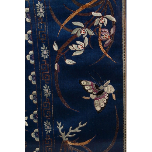 439 - TWO CHINESE EMBROIDERED SILK FRAMED PICTURES, the larger depicting floral decoration with butterflie... 