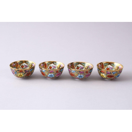 44 - FOUR CHINESE REPUBLIC STYLE PORCELAIN CUPS IN BOX, decorated upon a gilt ground with flora and butte... 