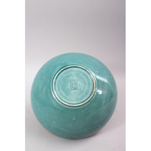 440 - A CHINESE SONG STYLE CELADON CRACLE GLAZED POTTERY BOWL, the exterior with a blue ground and an impr... 