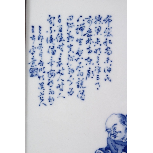 441 - A GOOD CHINESE BLUE & WHITE PORCELAIN FRAMED TILE OF LUOHAN AND CHILDREN, in a landscape setting, th... 