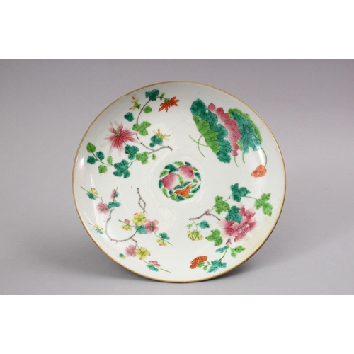 446 - A 19TH CENTURY CHINESE FAMILLE ROSE PORCELAIN STEM DISH, decorated with native array of flora with a... 