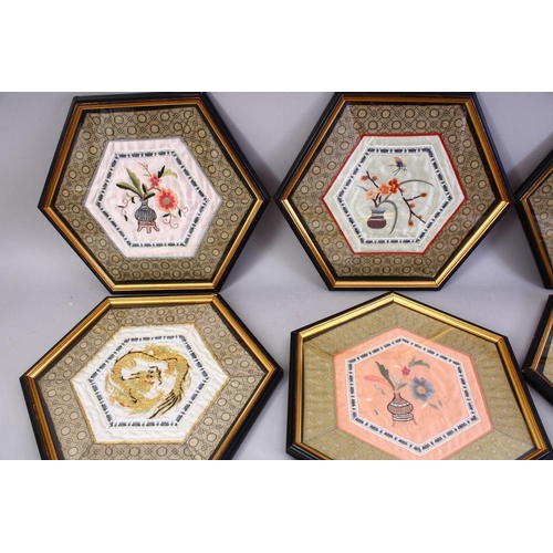 449 - EIGHT CHINESE 19TH / 20TH CENTURY EMBROIDERED SILK PANELS - FRAMED, of hexagonal form, each with an ... 