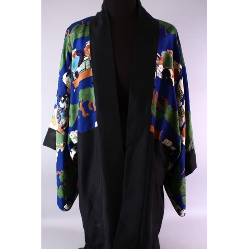 452 - A GOOD CHINESE 19TH / 20TH CENTURY PAINTED SILK ROBE, the black ground robe with painted decorated s... 