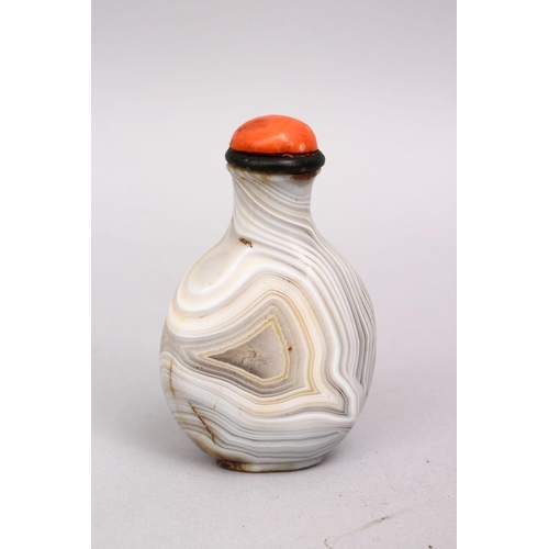 456 - A FINE 19TH / 20TH CENTURY CHINESE CARVED AGATE SNUFF BOTTLE, with a coral stopper, 8cm.