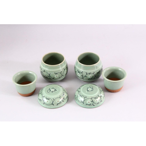 468 - THREE 20TH CENTURY KOREAN CELADON PORCELAIN TEA SET, the body decorated with formal floral display, ... 