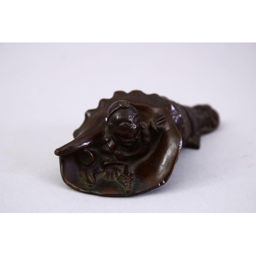 47 - A GOOD JAPANESE BRONZE OKIMONO OF A BOY AND CONCH SHELL, base signed. 9cm.