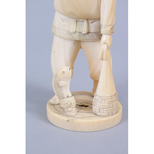 481 - A JAPANESE MEIJI PERIOD CARVED IVORY OKIMONO OF A FISHERMAN, the man stood holding his net, with one... 