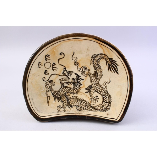 496 - A GOOD CHINESE CI ZHOU POTTERY PILLOW - DRGAON, The pillow decorated with the scenes of a dragon and... 