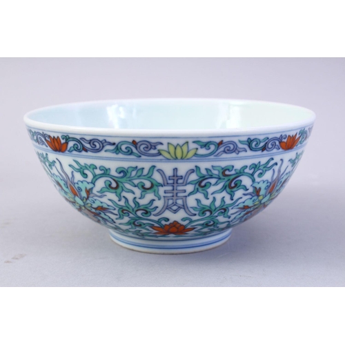 498 - A GOOD CHINESE DOUCAI DECORATED PORCELAIN BOWL, the body decorated with scenes of formal scrolling f... 