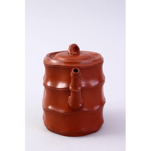 501 - A GOOD CHINESE YIXING CLAY BAMBOO FORMED TEA POT, The base with an impressed seal mark, 11cm high.