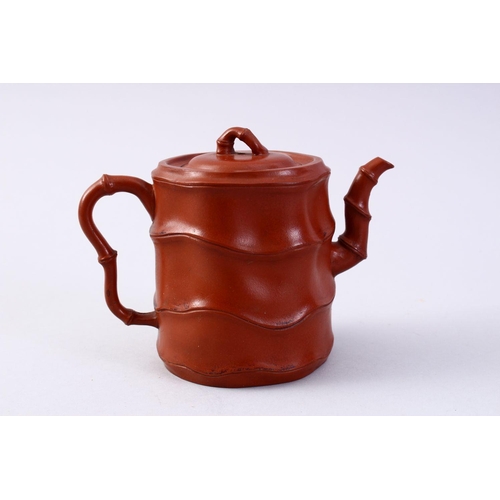 501 - A GOOD CHINESE YIXING CLAY BAMBOO FORMED TEA POT, The base with an impressed seal mark, 11cm high.