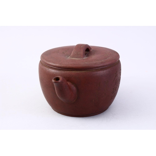 502 - A CHINESE YIXING CLAY CALLIGRAPHY TEA POT, the body of the pot with carved calligraphy, also to the ... 