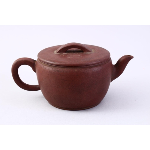 502 - A CHINESE YIXING CLAY CALLIGRAPHY TEA POT, the body of the pot with carved calligraphy, also to the ... 