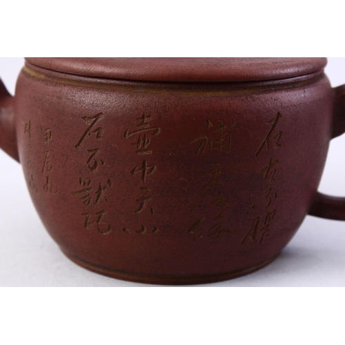 502 - A CHINESE YIXING CLAY CALLIGRAPHY TEA POT, the body of the pot with carved calligraphy, also to the ... 