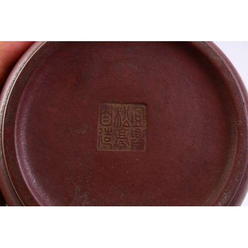 502 - A CHINESE YIXING CLAY CALLIGRAPHY TEA POT, the body of the pot with carved calligraphy, also to the ... 