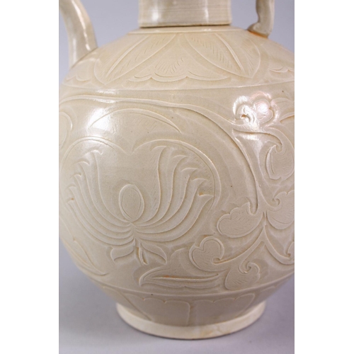 506 - A GOOD CHINESE DING WARE POTTERY WINE EWER, the body with carved decoration 20cm x 17cm