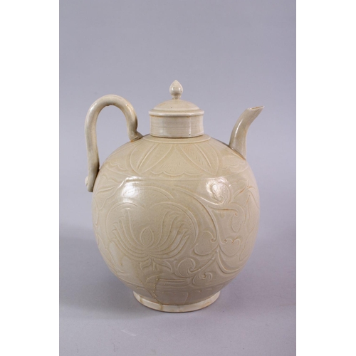 506 - A GOOD CHINESE DING WARE POTTERY WINE EWER, the body with carved decoration 20cm x 17cm