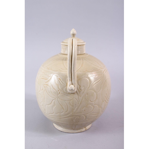 506 - A GOOD CHINESE DING WARE POTTERY WINE EWER, the body with carved decoration 20cm x 17cm