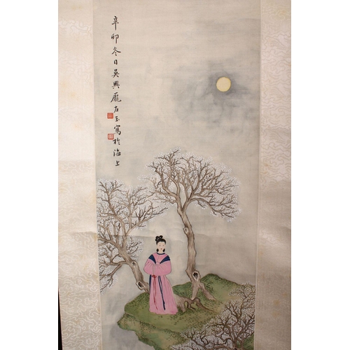 526 - A 20TH CENTURY CHINESE SCROLL PAINTING, depicting a young lady standing a landscape setting beneath ... 