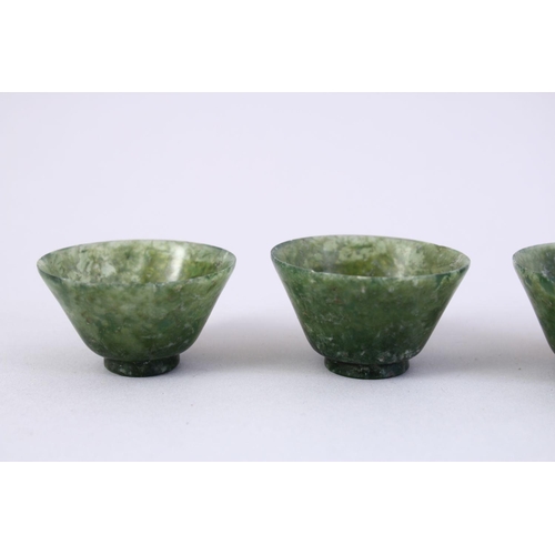 55 - FIVE GOOD CHINESE CARVED SPINACH JADE BOWLS, 5cm.