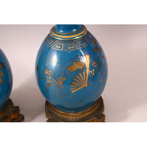 59 - A PAIR OF 19TH CENTURY CHINESE PORCELAIN BOTTLE VASES / LAMP BASES, the ground with gilded decoratio... 