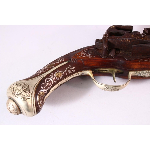 610 - AN 18TH CENTURY INDIAN FLINTLOCK PISTOL, with gold inlaid barrel, carved stone, profusely inlaid wit... 