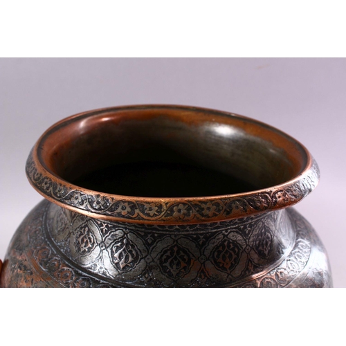 614 - A 17TH CENTURY INDIAN TINNED COPPER LARGE CIRCULAR BOWL, with foliate engraved rim, the neck and sid... 