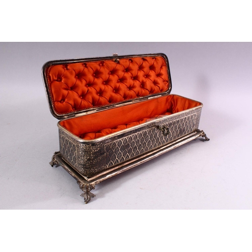 615 - A BIDRI SILVER INLAID RECTANGULAR HINGED CASKET for the European market, with panels of scrolling in... 