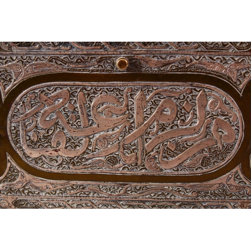 619 - A GOOD LATE 19TH CENTURY ISLAMIC SILVER INLAID BRASS RECTANGULAR CASKET, each side with panels of ca... 