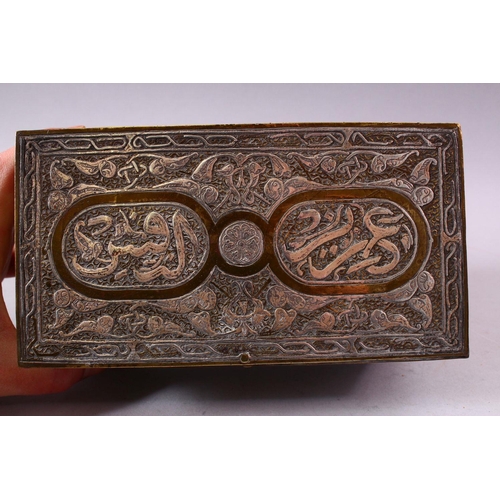 619 - A GOOD LATE 19TH CENTURY ISLAMIC SILVER INLAID BRASS RECTANGULAR CASKET, each side with panels of ca... 