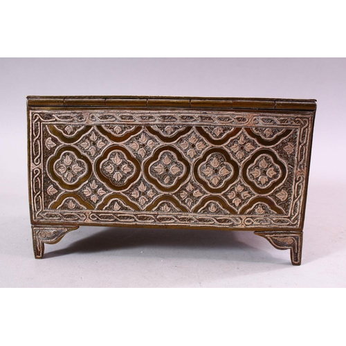 619 - A GOOD LATE 19TH CENTURY ISLAMIC SILVER INLAID BRASS RECTANGULAR CASKET, each side with panels of ca... 