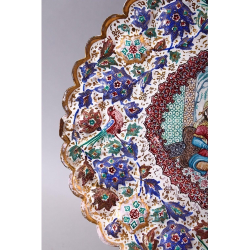 640 - AN INDIAN ENAMELLED COPPER DISH of lobed oval form, the centre painted with a courting couple and mu... 