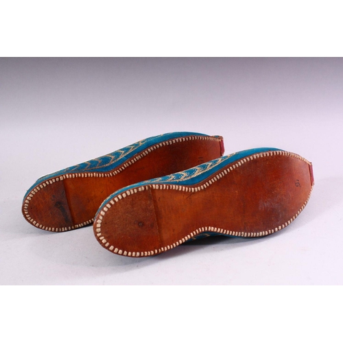 641 - A PAIR OF TURKISH EMBROIDERED LEATHER SHOES.