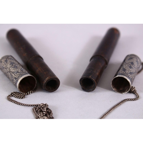 651 - A FINE PAIR OF 19TH CENTURY CAUCASIAN NIELLO INLAID SILVER CARTRIDGE CASES, both with the same decor... 