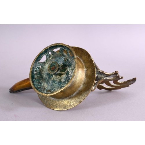 654 - AN UNUSUAL EARLY ISLAMIC POSSIBLY ANDALUSIAN SPANISH BRASS OIL LAMP, with moulded decoration, 17cm w... 