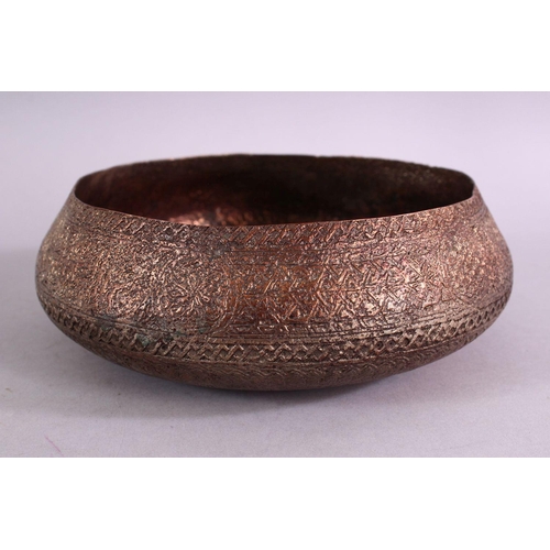 662 - A 16TH CENTURY MAMLUK TINNED COPPER CALLIGRAPHIC BOWL &  MAMLUK BLAZONS DECORATION, 17cm diameter.