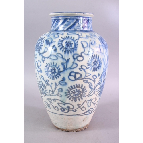 665 - A LARGE 18TH CENTURY PERSIAN SAFAVID BLUE & WHITE GLAZED POTTERY VASE, the vase decorated with styli... 