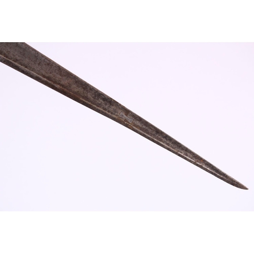 668 - A FINE 18TH / 19TH CENTURY LARGE INDIAN WATERED STEEL DAGGER, with a carved wooden handle, 45cm