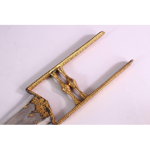 670 - A FINE 18TH CENTURY MUGHAL INDIAN GOLD INLAID WATERED STEEL KATAR DAGGER IN SCABBARD, the 34cm.