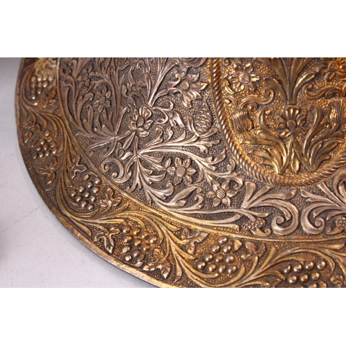 683 - A FINE 19TH CENTURY INDIAN SILVER AND GILT HUQQA BASE, pierced with floral decoration, with two late... 