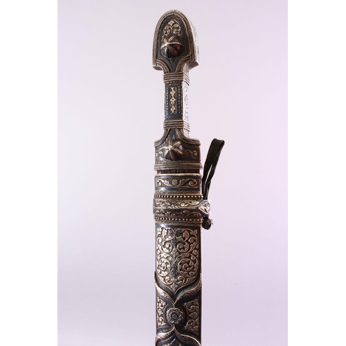 692 - A 19TH CENTURY RUSSIAN KINJAL DAGGER with niello decoration to the scabbard and hilt, 47cm long.