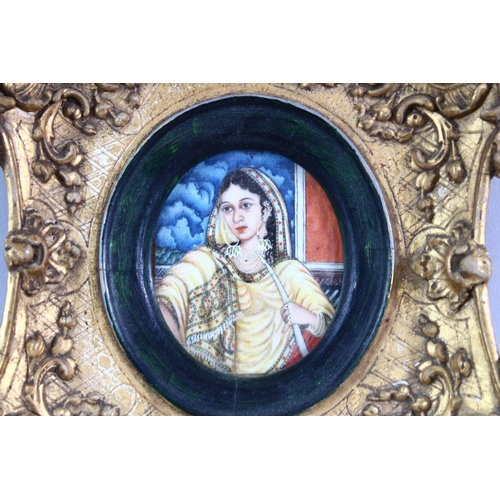 694 - THREE SMALL LATE 19TH CENTURY INDIAN OVAL PORTRAIT MINIATURES, 15cm x 14cm and smaller.