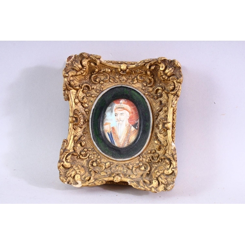 694 - THREE SMALL LATE 19TH CENTURY INDIAN OVAL PORTRAIT MINIATURES, 15cm x 14cm and smaller.