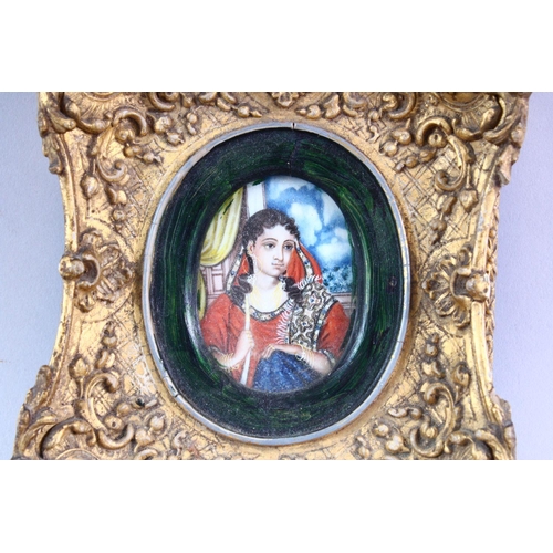 694 - THREE SMALL LATE 19TH CENTURY INDIAN OVAL PORTRAIT MINIATURES, 15cm x 14cm and smaller.