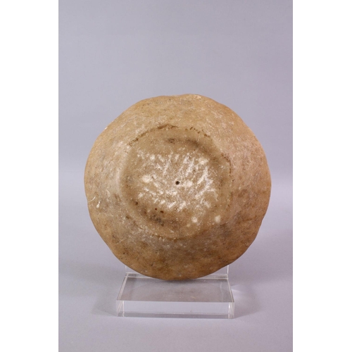 696 - AN EYGPTIAN ALABASTER SHALLOW CIRCULAR BOWL, 23cm diameter.