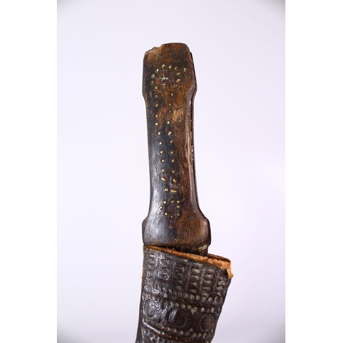 698 - A 20TH CENTURY RUSSIAN KINJAL DAGGER with filigree decoration and three other knives.